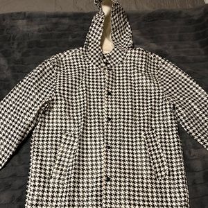 Black and white rain coat